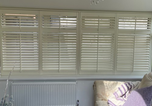 Cream Lounge Shutters with mid rails